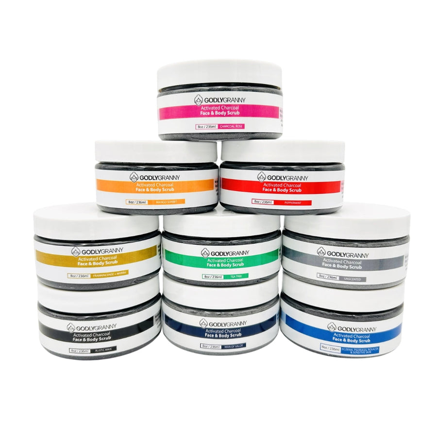 Assorted Activated Charcoal Face & Body Scrub packages shown together