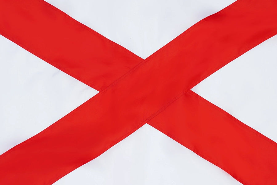 Alabama state flag close-up showing crimson St. Andrew's cross