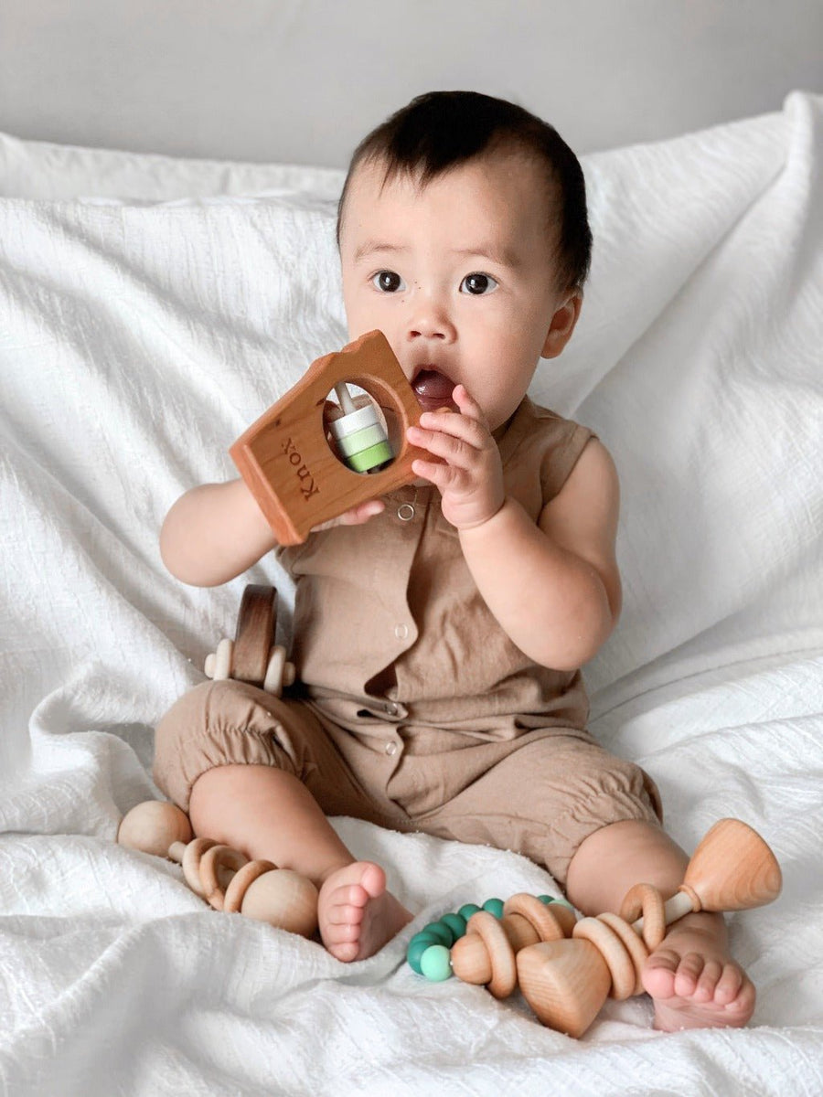 Alabama cherry wood rattle in a lifestyle setting