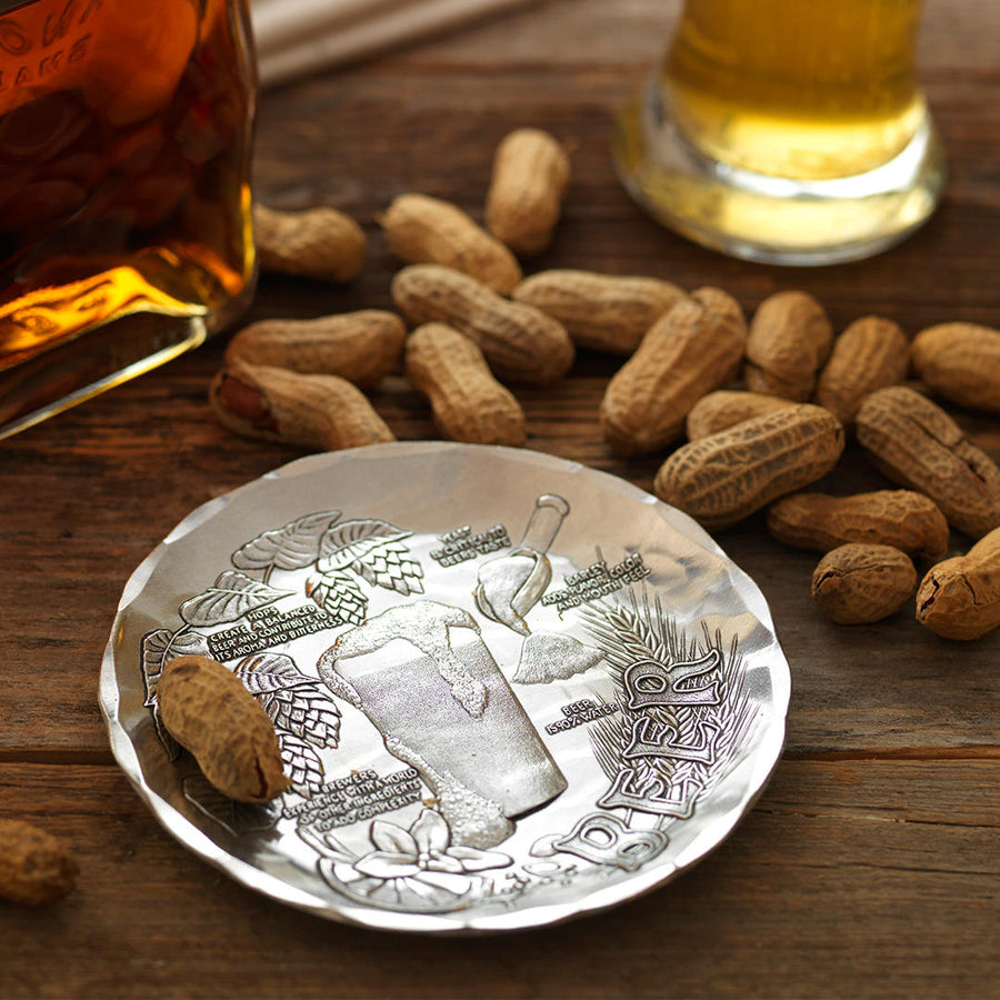 Styled display featuring Anatomy of a Beer Coaster
