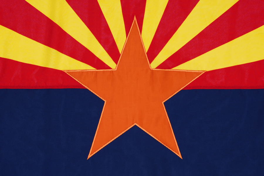 Arizona state flag close-up with sun rays and copper star