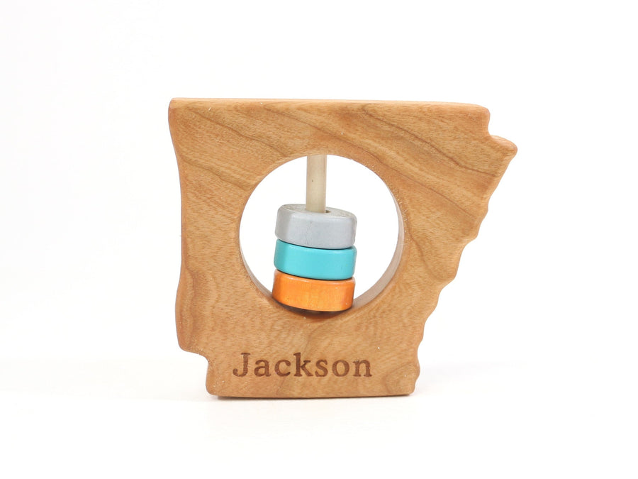 Arkansas cherry wood rattle with an example of engraved personalization
