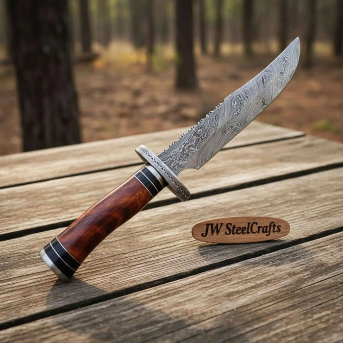 Handmade clip-point Bowie knife with patterned Damascus fixed blade