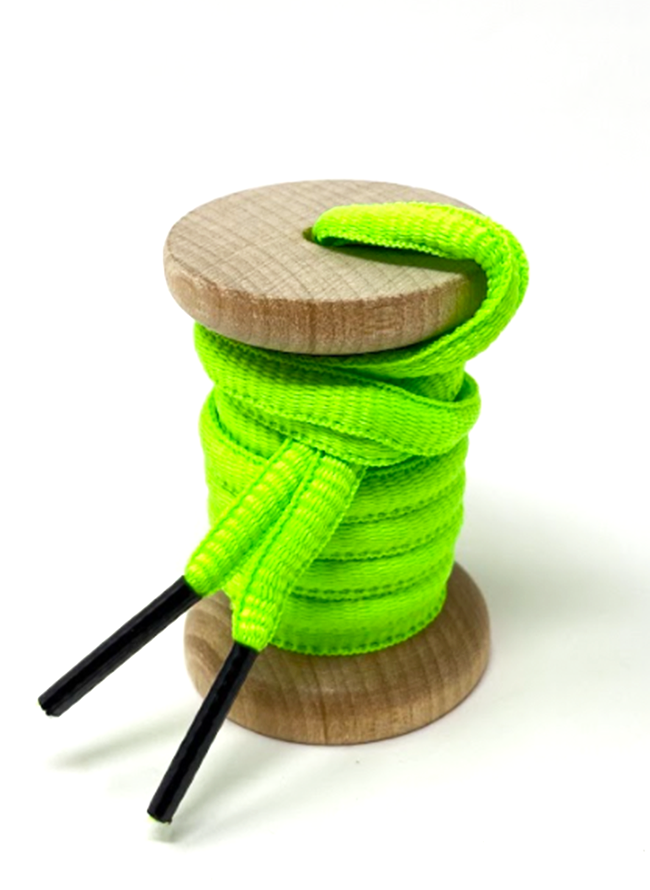 Neon Green oval athletic shoelaces on a wooden spool