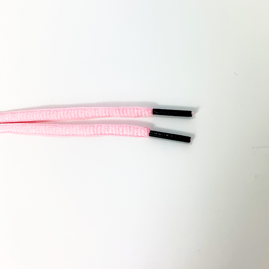 Pink oval athletic shoelaces close-up of oval lace ends and wrapped aglets
