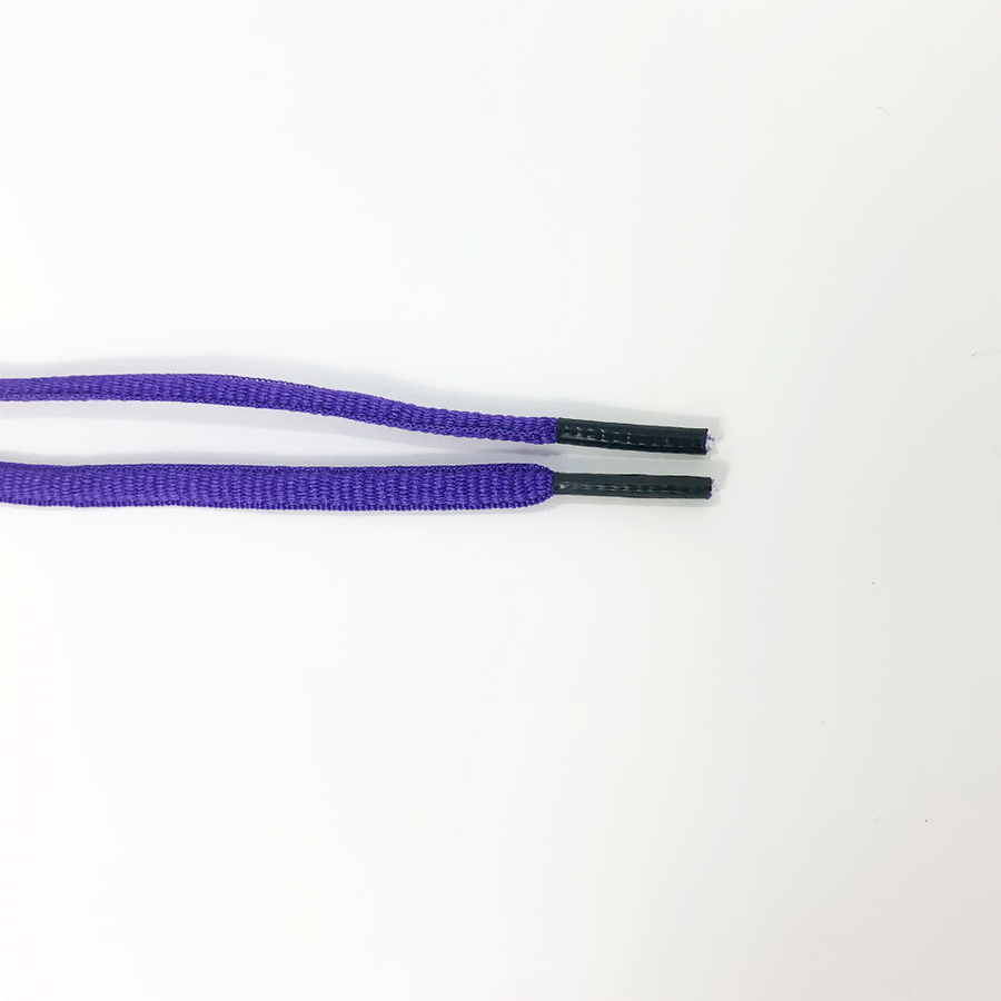 Purple oval athletic shoelaces close-up of oval lace ends and wrapped aglets
