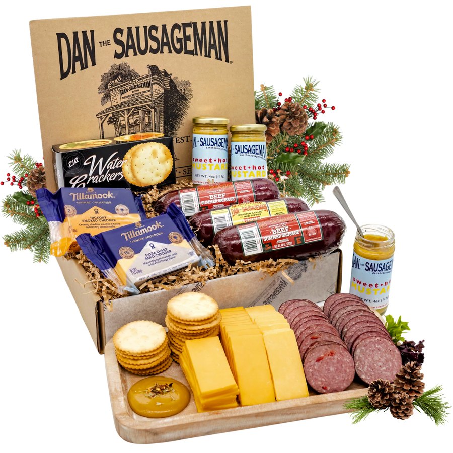 Bare Necessities gift box with sausage, cheese, crackers and mustard in a holiday serving display