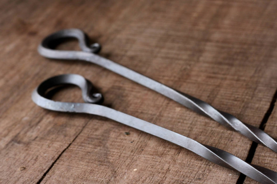 Two skewer handles showing the forged loop design