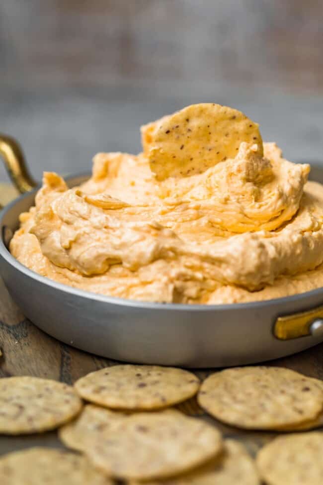 Beer cheese dip with crackers in a bowl