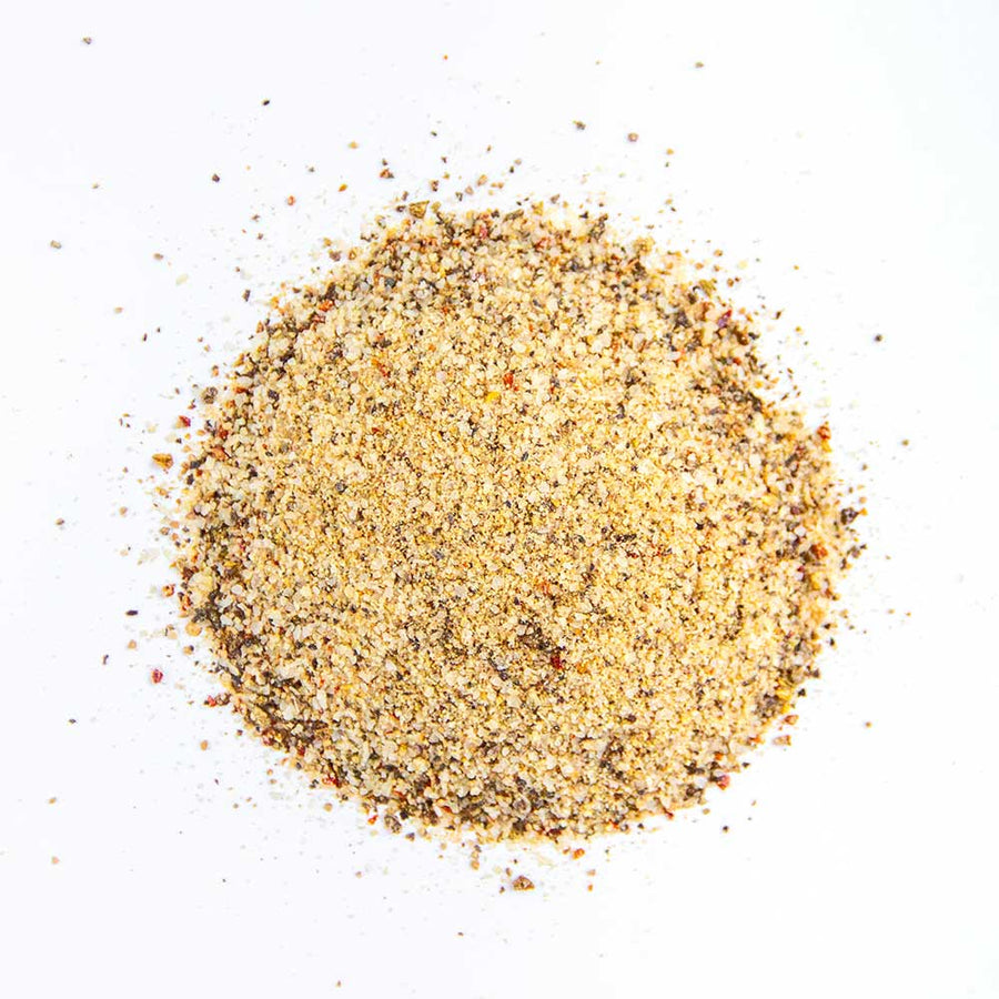Jallelujah Jalapeño All-Purpose Seasoning: Coarse jalapeño seasoning on a white background
