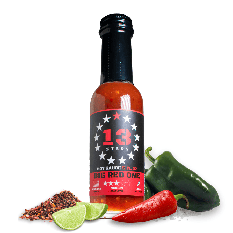 Big Red One hot sauce bottle with red jalapeño, poblano pepper and lime