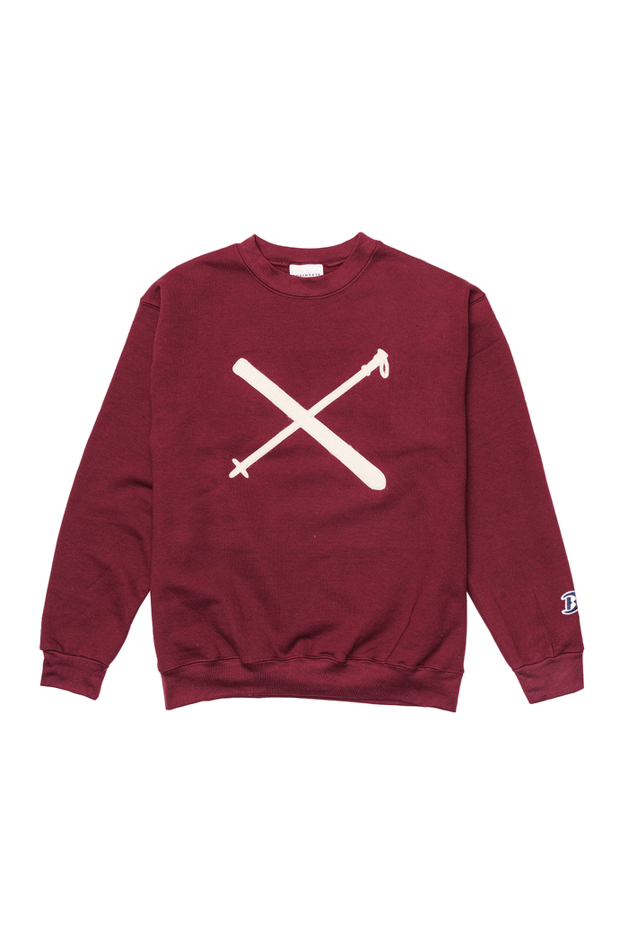 Crossed Skis Felt Crewneck Sweatshirt: burgundy sweatshirt with crossed skis felt design.