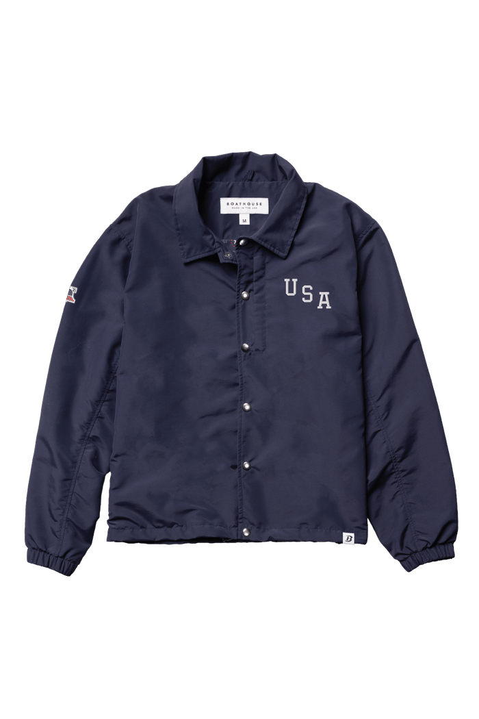 USA Coaches Jacket: navy USA coaches jacket, front view.