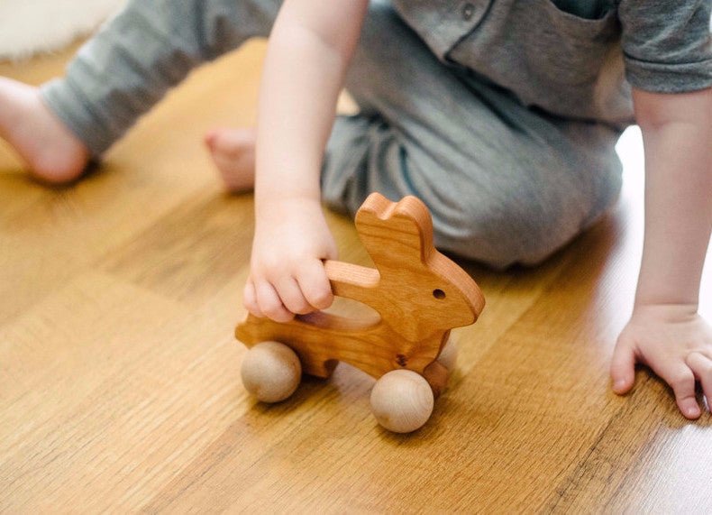 Wooden Bunny Push Toy: Cherry Wood with Rolling Wheels
