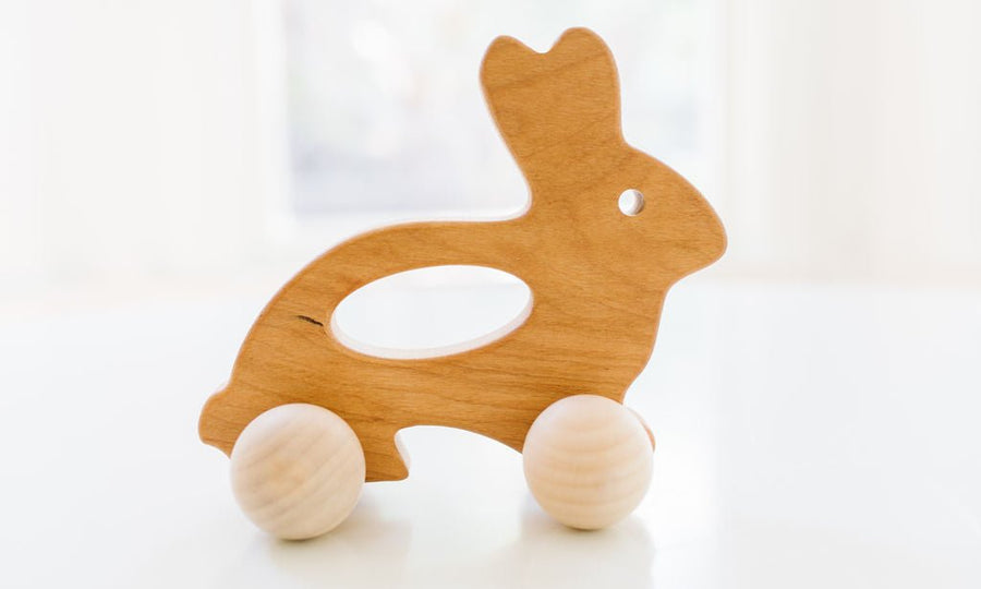 Wooden Bunny Push Toy: Cherry Wood with Rolling Wheels