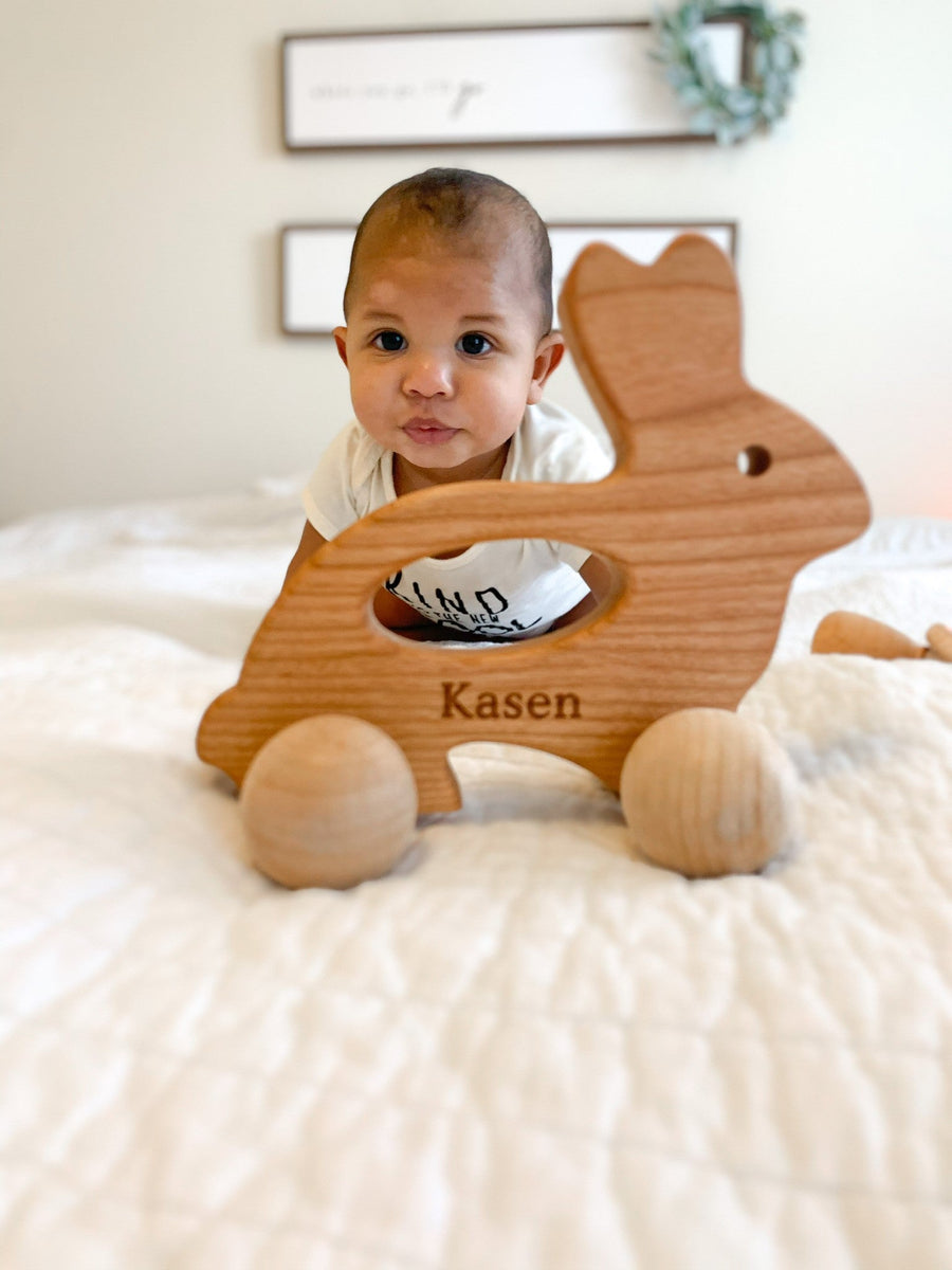 Wooden Bunny Push Toy: Cherry Wood with Rolling Wheels