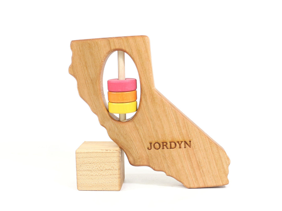 California cherry wood rattle in a lifestyle setting