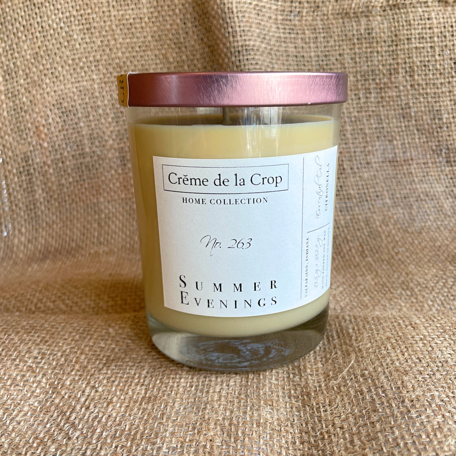 Summer Evenings citronella candle in a glass with its optional lid