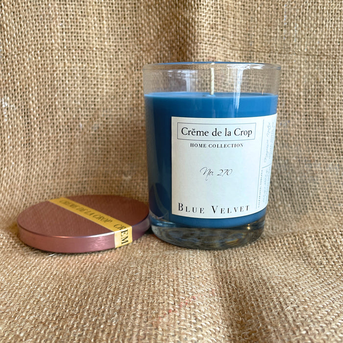 Blue Velvet Soy Candle in a glass container with the lid removed