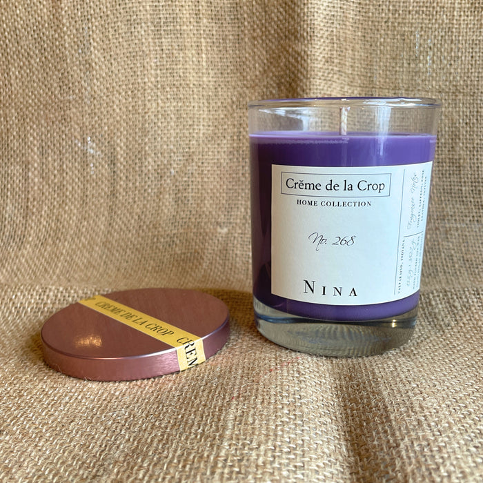 Nina Soy Candle in a labeled glass container