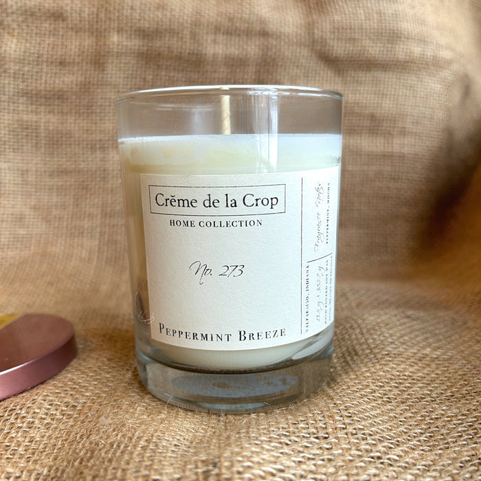 Peppermint Breeze Soy Candle in a labeled glass container