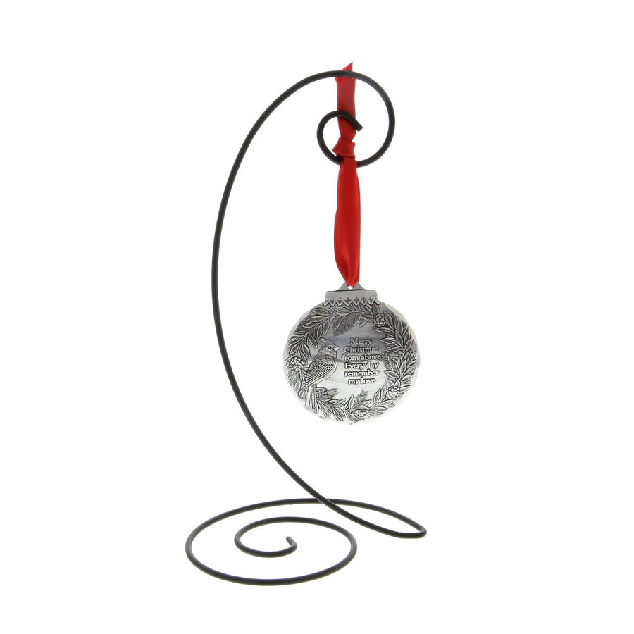 Styled display featuring Cardinal Remembrance Ornament