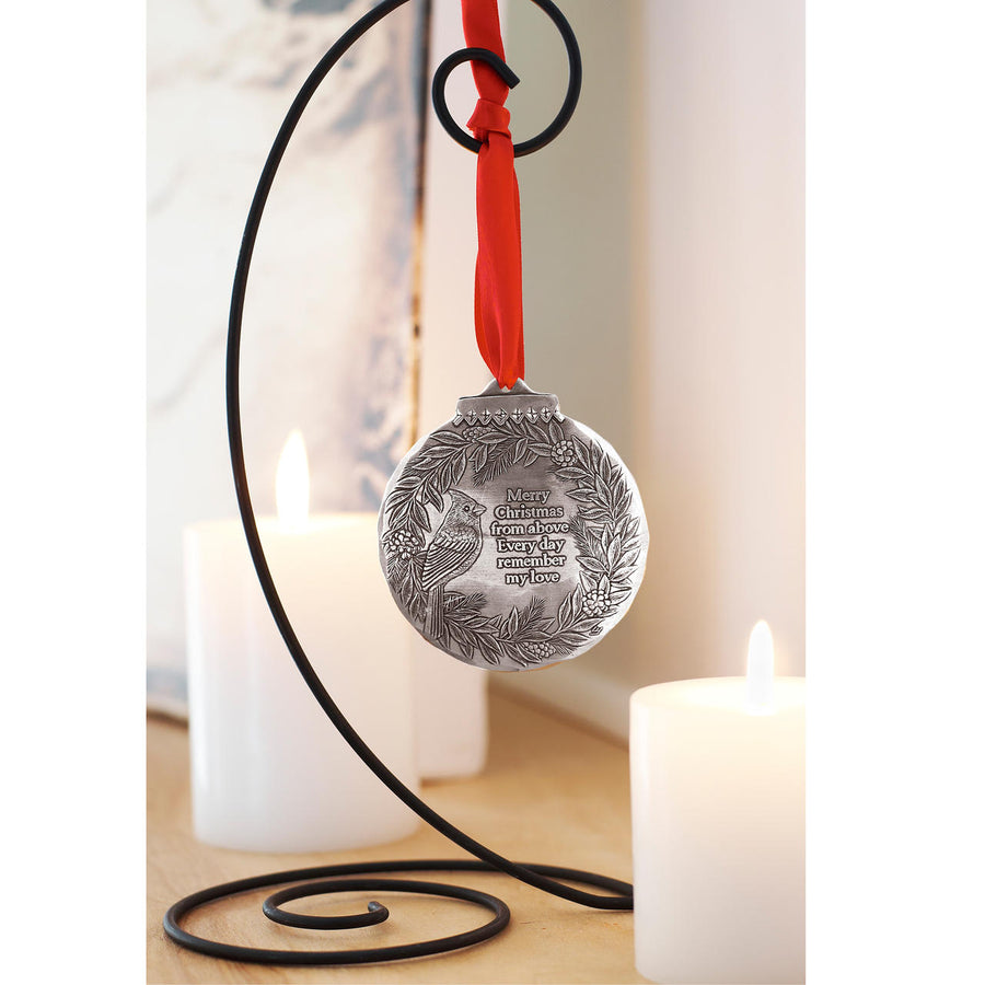 Styled display featuring Cardinal Remembrance Ornament