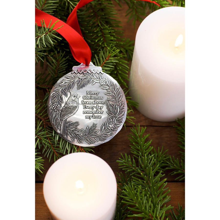 Styled display featuring Cardinal Remembrance Ornament