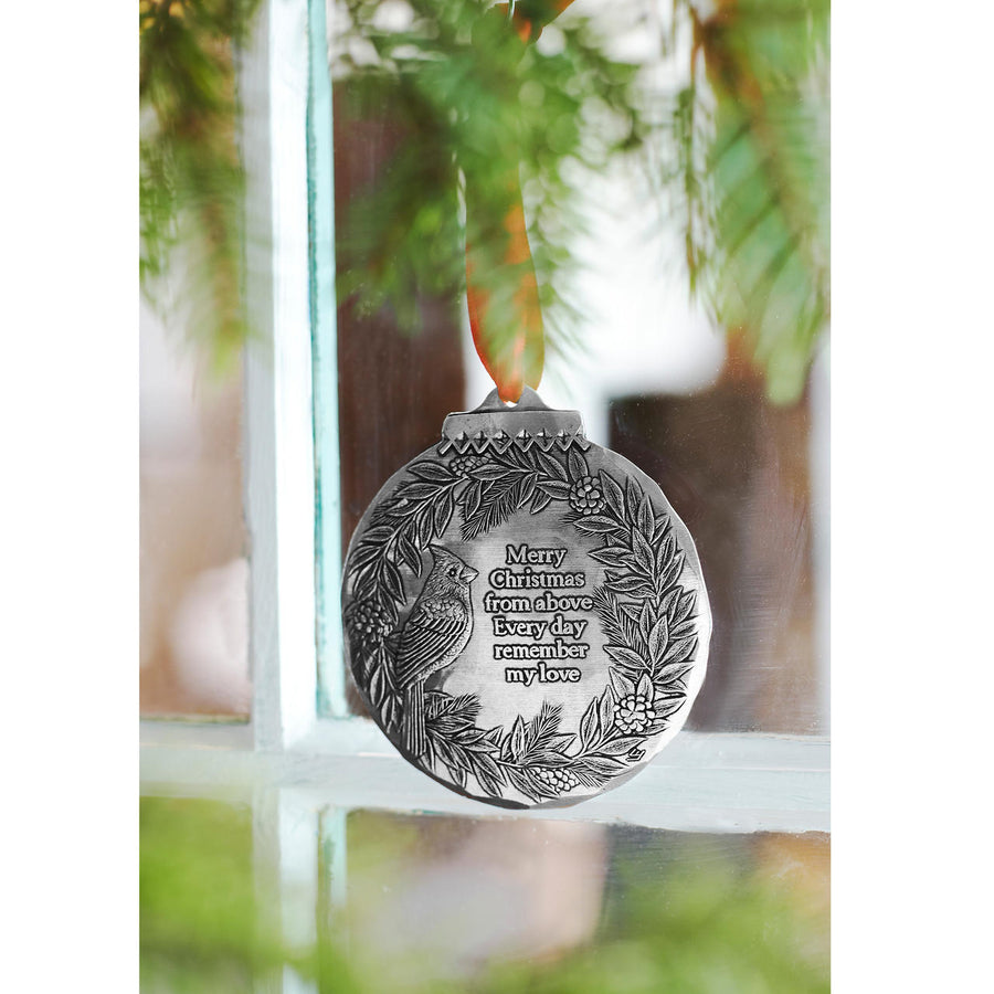 Styled display featuring Cardinal Remembrance Ornament