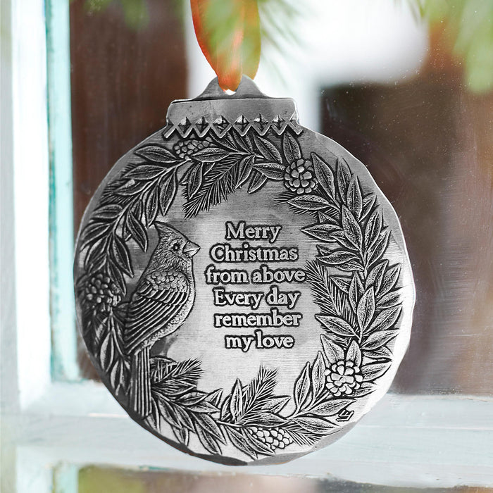 Styled display featuring Cardinal Remembrance Ornament