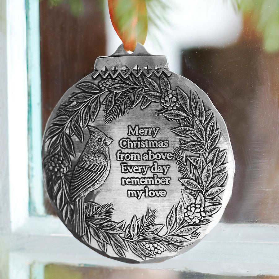 Styled display featuring Cardinal Remembrance Ornament