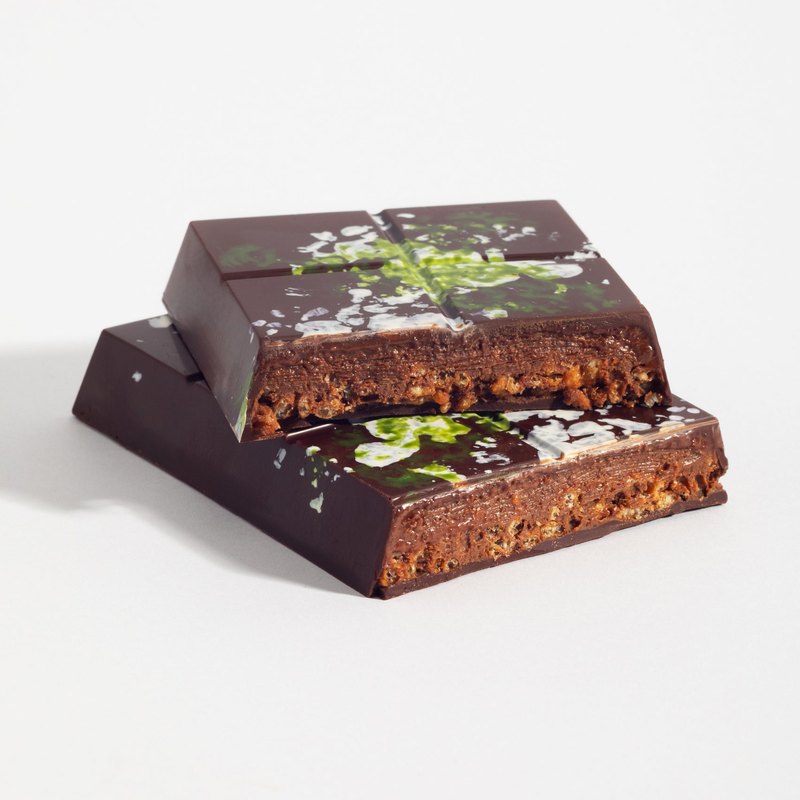 Hazelnut Praline Crunch bar cut open to show the filling