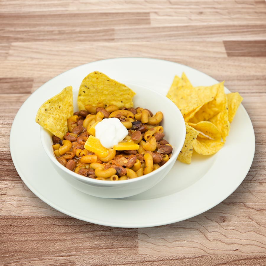 Prepared chili mac with chips, serving suggestion