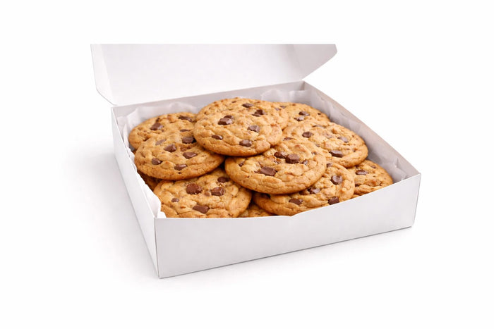 Open white gift box containing chocolate chunk cookies