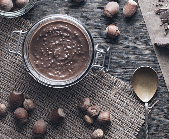 Chocolate and hazelnut spread pictured as flavor inspiration for Chocolate Hazelnut Decaf coffee