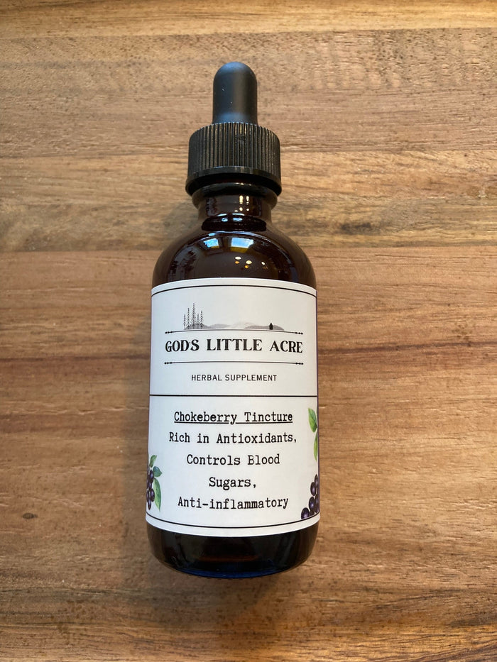 Black Chokeberry Tincture in its amber glass bottle with dropper with supplier branding