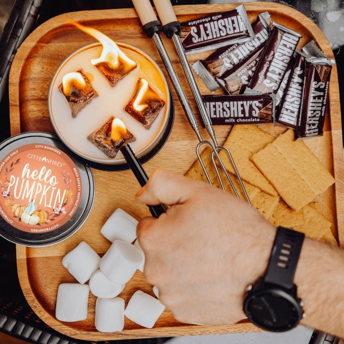 Fall Edition lid on a board with chocolate and crackers