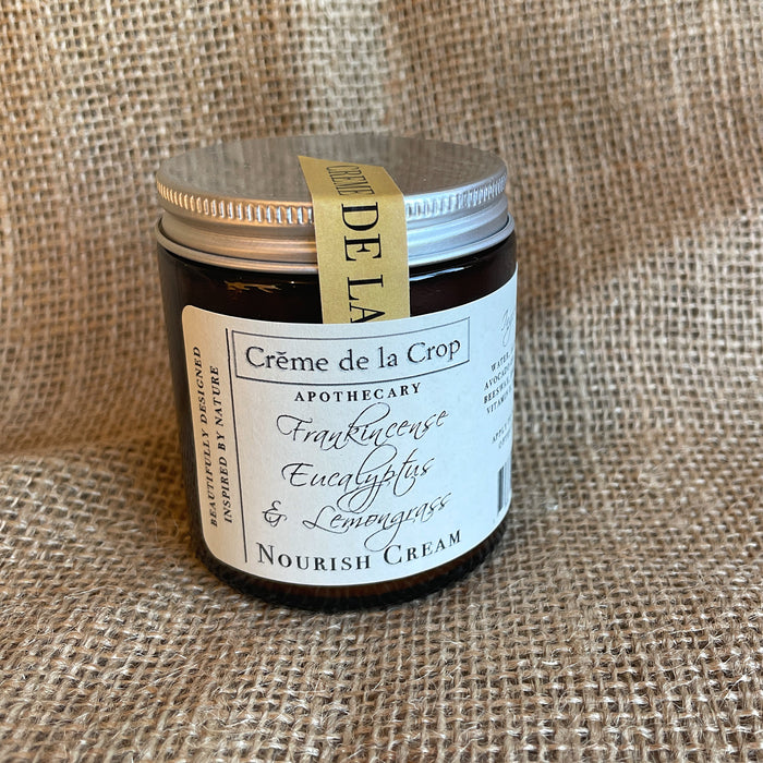 Nourish Moisturizing Cream - Frankincense & Lemongrass in its labeled container