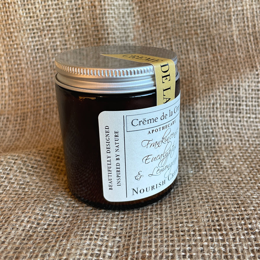Nourish Moisturizing Cream - Frankincense & Lemongrass jar showing the side label