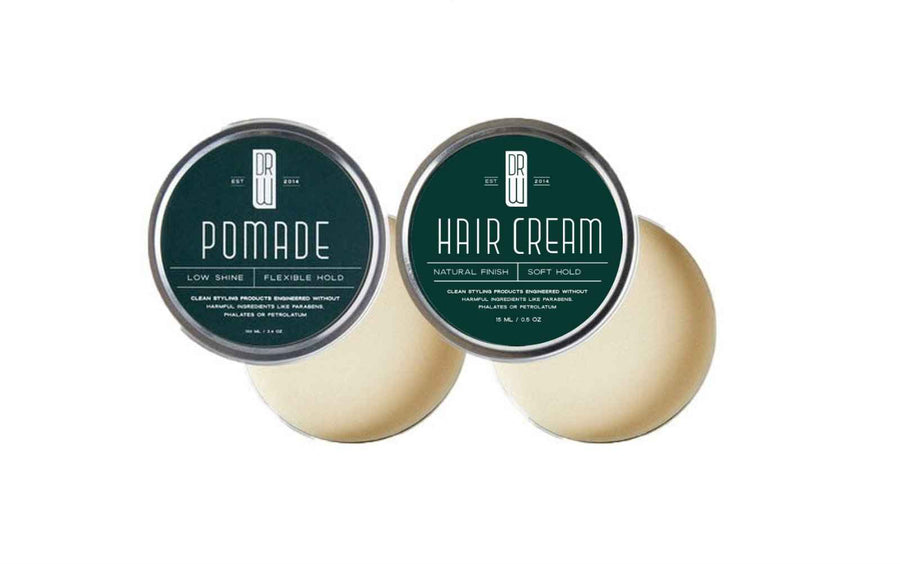 Open pomade and hair cream sample jars with their labeled lids