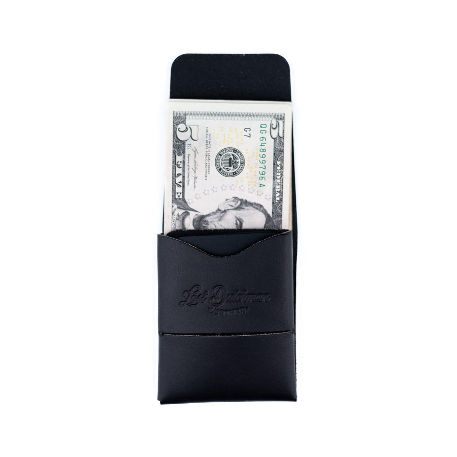 Black Franklin 2 leather wallet, open cash wrap holding a U.S. bill