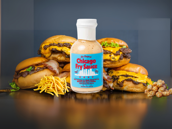 Chicago Fry Sauce bottle in front of several burgers