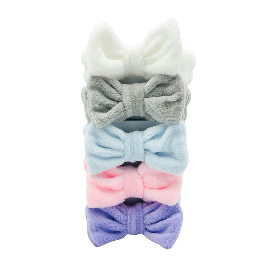 White, gray, blue, pink and purple bow headbands stacked together