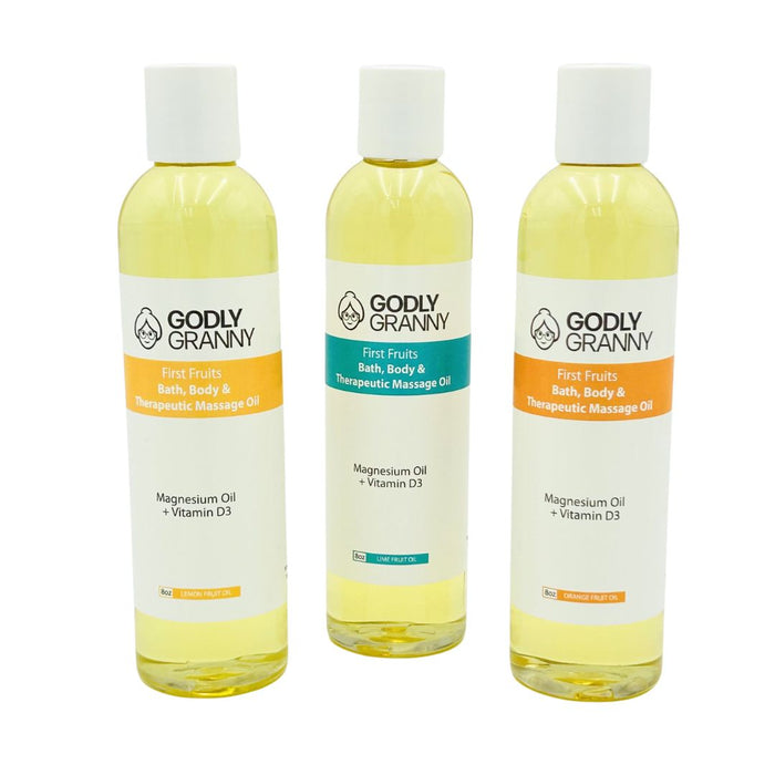 Assorted First Fruits Citrus Bath, Body & Massage Oil packages shown together