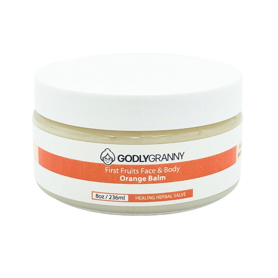 First Fruits Orange Herbal Face & Body Salve – 8oz Jar packaging