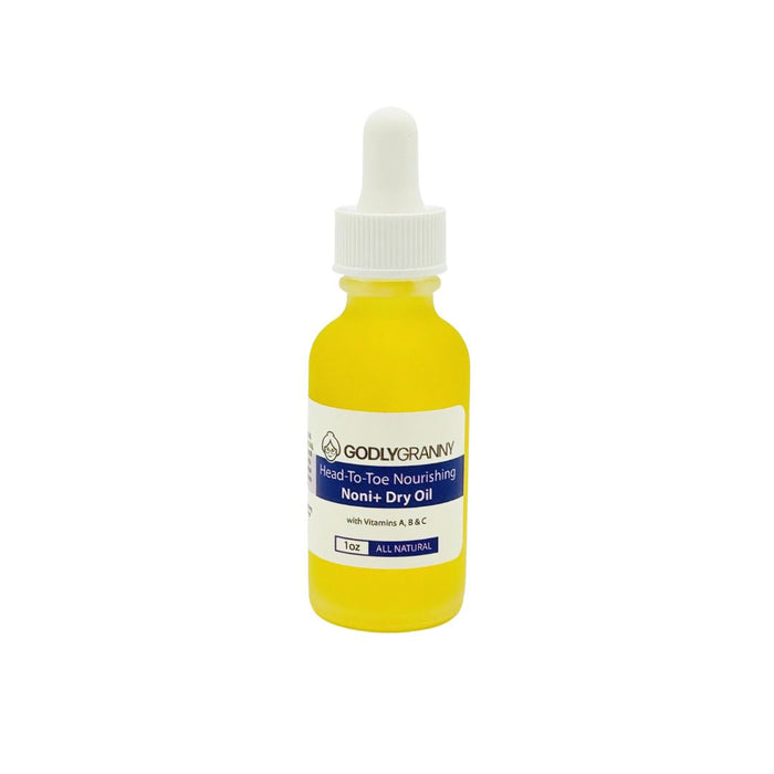 Noni+ face and body dry oil in a glass dropper bottle