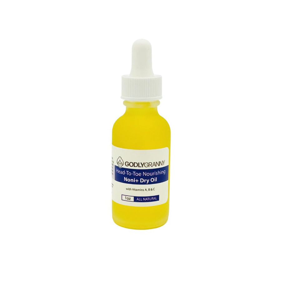 Noni+ face and body dry oil in a glass dropper bottle