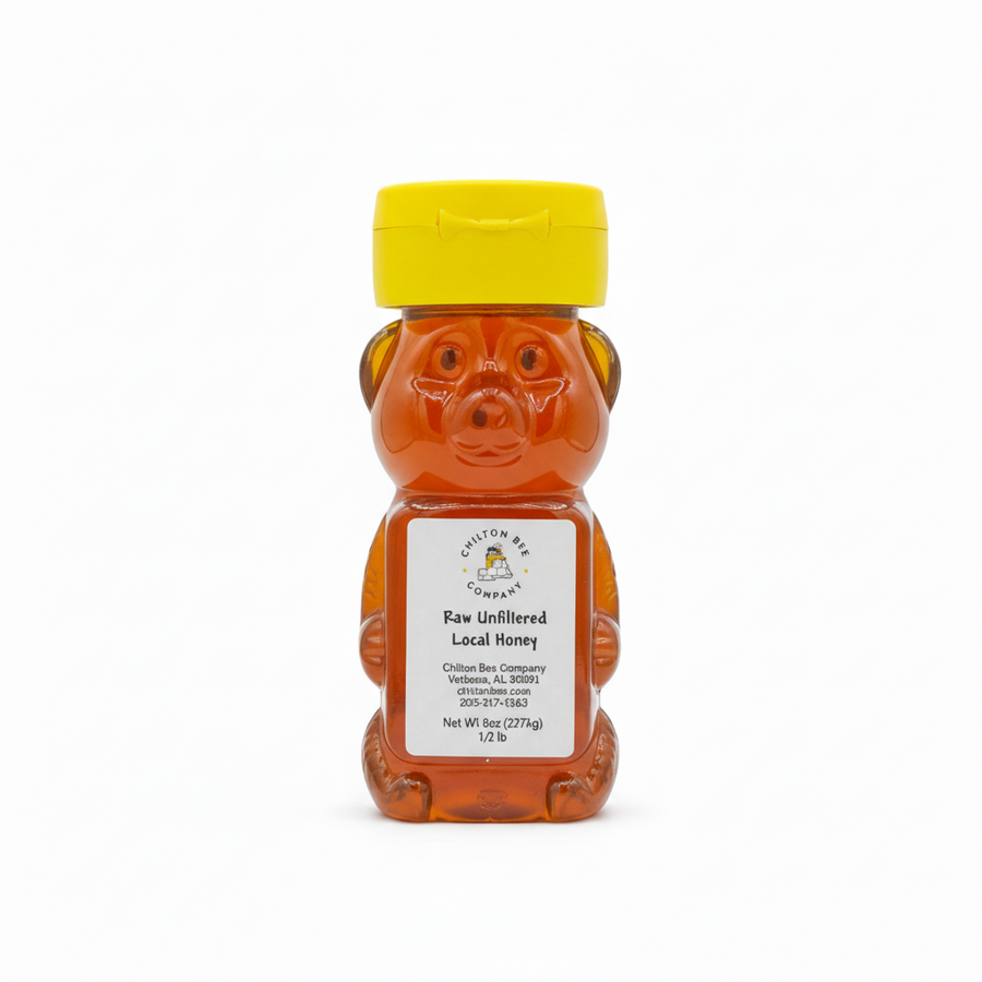 Half-pound raw Alabama honey bear bottle on white