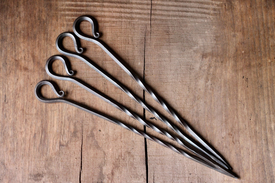 Set of four hand-forged steel BBQ skewers