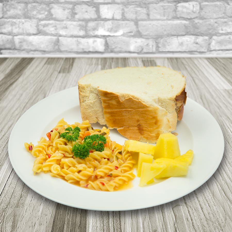 Prepared rice meal with pineapple and bread, serving suggestion